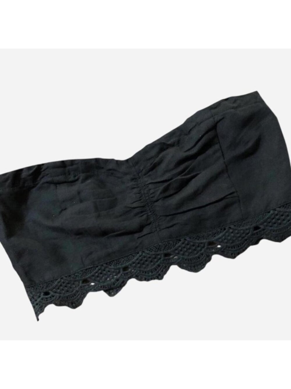 Free People black strapless top with crochet trim....